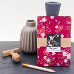 Carnet A6 - Fleurs sur fond fuchsia