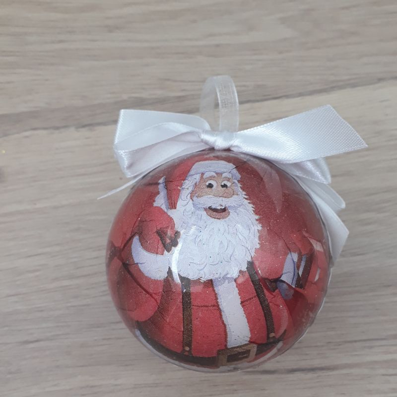 Petite boule décorée à la main. Motif : père noel